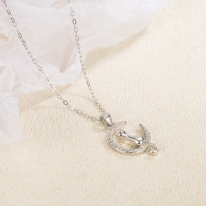 Elegant S925 sterling silver moon and cat pendant necklace with pavé cubic zirconia