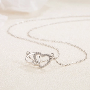 Elegant S925 sterling silver interlocking double heart necklace with sparkling zircon stones