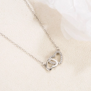 Polished S925 silver interlocking double heart pendant necklace with zircon stones