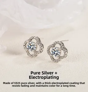 Macro detail of S925 sterling silver flower stud earrings with sparkling pavé crystals