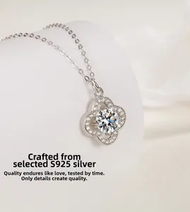 Macro detail of S925 sterling silver four-leaf clover pendant with sparkling cubic zirconia