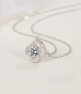 Macro detail of S925 silver four-leaf clover pendant with sparkling zircon inlay