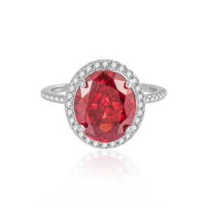 Sterling silver halo ring with large oval red gemstone and white side stones