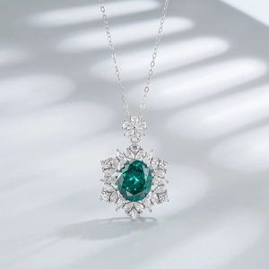 925 silver snowflake necklace featuring an emerald-cut blue stone with sparkling zircons