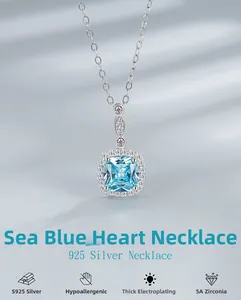 Macro shot of S925 silver heart necklace with blue 5A zirconia and halo setting
