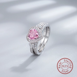Close-up of 925 sterling silver heart ring with pink ice cut zircon and hallmark