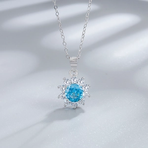 Collier tournesol en argent 925 avec pierre bleue de 6mm et accents de zircon blanc