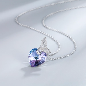 S925 Sterling silver necklace with purple crystal heart pendant and swan wing detail