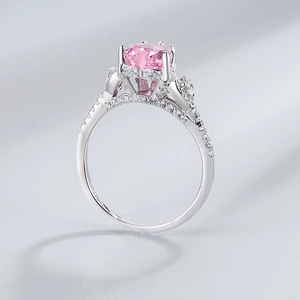 Detail view of 925 sterling silver ring with oval pink carbon diamond and pavé setting