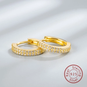 Close-up of gold S925 sterling silver hoop earrings with double row zircon pave setting