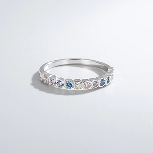 Detail of S925 silver ring featuring heart-cut multi-color zircon stones in claw setting