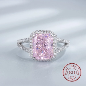 Macro shot of 925 silver halo ring with large radiant-cut pink high carbon diamond