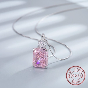 Macro shot of S925 sterling silver perfume bottle pendant with pink ice cut cubic zirconia