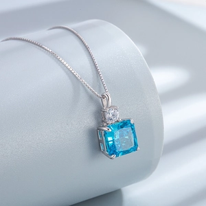 S925 sterling silver necklace with ice cut blue radiant gemstone pendant in 4-prong setting