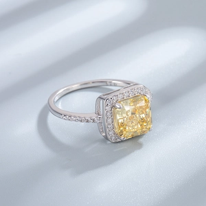 S925 silver halo ring featuring square yellow ice cut high carbon diamond and pavé band