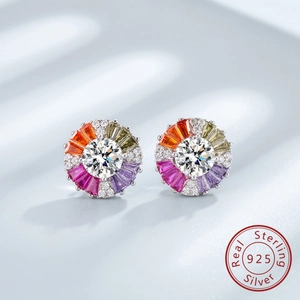 Macro shot of 925 sterling silver studs with colorful baguette zircon pavé detail