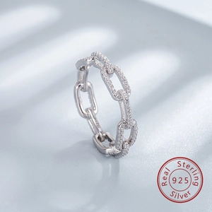 Macro shot of S925 sterling silver chain ring with micro-pave cubic zirconia diamonds