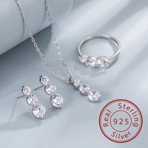 Detailed view of S925 sterling silver jewelry set with necklace, ring and earrings