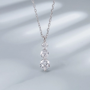 Elegant S925 sterling silver necklace featuring three graduated round-cut sparkling zircons