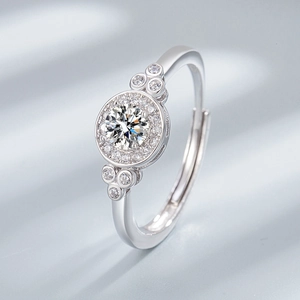 Adjustable S925 sterling silver halo ring featuring a brilliant round star cut cubic zirconia