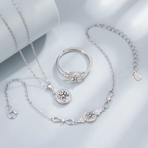 Sparkling 925 silver halo jewelry set with round zircon necklace, ring, and infinity bracelet
