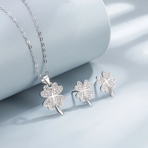 Elegant S925 silver four-leaf clover jewelry set with necklace and stud earrings