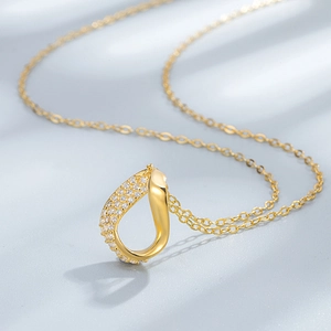 Elegante S925 Silber Möbius-Halskette mit Tropfenanhänger, Zirkonia und Goldfinish