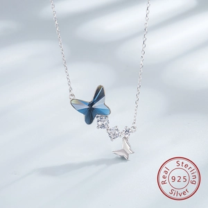 Detailed close-up of S925 sterling silver butterfly necklace with blue crystal pendant