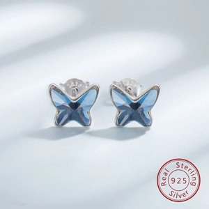Macro shot of S925 sterling silver mark on blue crystal butterfly stud earring back