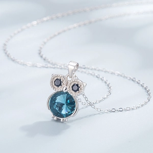 S925 sterling silver owl necklace with round blue crystal and black gem eyes
