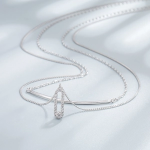 Double-layered S925 silver necklace featuring a diamond-set geometric capsule pendant