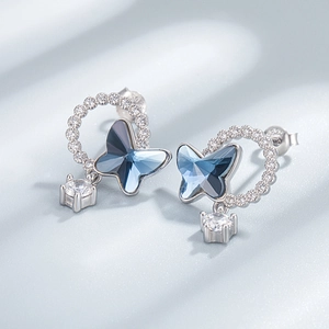 Elegant 925 sterling silver butterfly stud earrings with blue crystals and zircon drops