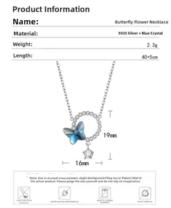 Macro detail of S925 silver butterfly necklace with blue crystal and size measurements