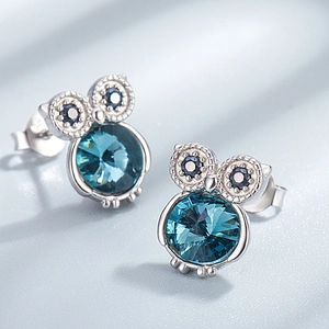 S925 sterling silver owl stud earrings featuring large deep blue Austrian crystals