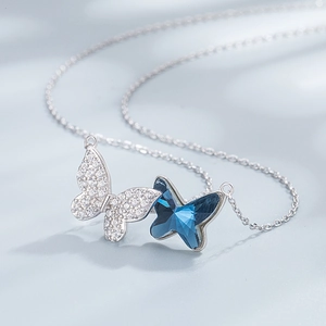 S925 sterling silver necklace featuring double butterfly pendant with blue crystals