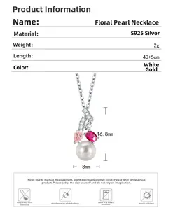 Detail of S925 silver flower pendant with pink gemstones and an 8mm freshwater pearl