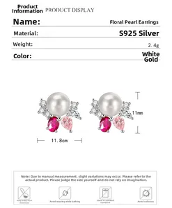 Gros plan de boucles d'oreilles fleurs en argent 925 et perles avec dimensions de l'objet