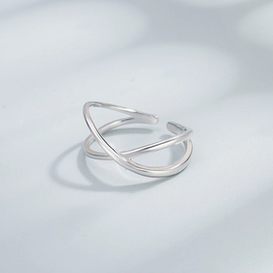 Detail of S925 sterling silver minimalist double-layer crossover open ring with polished finish