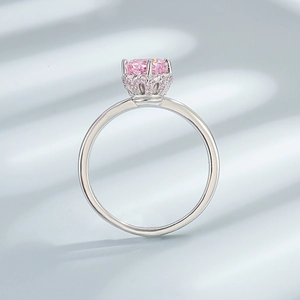 Elegant 925 sterling silver ring with pink oval gemstone in crown setting design