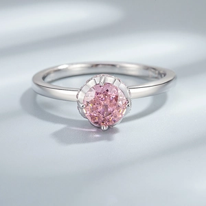 Elegant S925 silver ring featuring a round pink sparkling gemstone in a classic claw setting