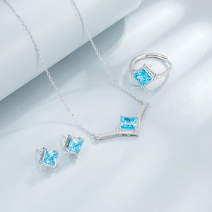 Parure de bijoux en argent S925 avec pierres bleues taille princesse et éclats de diamant