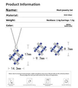Macro shot of S925 silver necklace and earrings with blue cubic zirconia grid design
