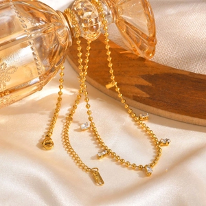 Collier chaîne à perles dorées en acier inoxydable avec zircons blancs carrés