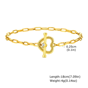Close-up of golden stainless steel OT buckle bracelet with heart-shaped zircon detail