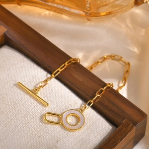 Gold OT clasp paperclip chain bracelet with a white shell inlay ring pendant for women