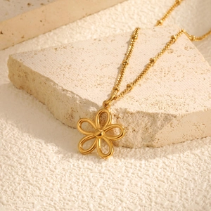 Elegant gold stainless steel necklace with hollow flower pendant and beaded chain detail