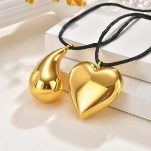 Minimalist gold heart and water drop pendant necklace with black cord and polished finish