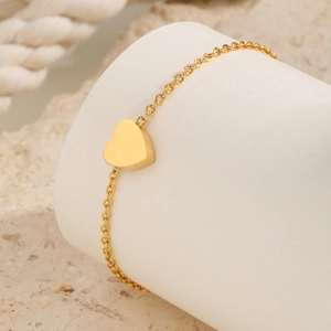 Elegant gold-plated stainless steel anklet with a polished heart pendant on a fine link chain