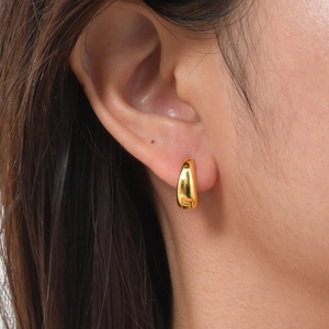Minimalist gold-plated U-shaped huggie earrings with thick teardrop design for women