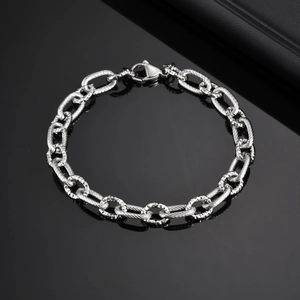 Men's stainless steel interlocking link bracelet with textured silver rings and lobster clasp